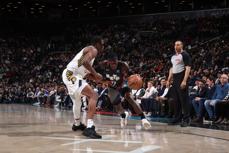 BROOKLYN, NY - APRIL 3: Dennis Schroder #17 of the Brooklyn Nets drives to the basket during the game against the Indiana Pacers on April 3, 2024 at Barclays Center in Brooklyn, New York. NOTE TO USER: User expressly acknowledges and agrees that, by downloading and or using this Photograph, user is consenting to the terms and conditions of the Getty Images License Agreement. Mandatory Copyright Notice: Copyright 2024 NBAE (Photo by Nathaniel S. Butler/NBAE via Getty Images)