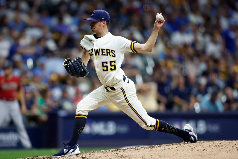 Oct 4, 2023; Milwaukee, Wisconsin, USA; Milwaukee Brewers relief pitcher Hoby Milner (55) pitches in the seventh inning against the Arizona Diamondbacks during game two of the Wildcard series for the 2023 MLB playoffs at American Family Field. Mandatory Credit: Kamil Krzaczynski-USA TODAY Sports