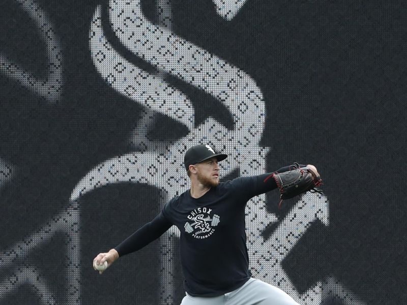 Apr 7, 2023; Pittsburgh, Pennsylvania, USA;  Chicago White Sox pitcher Michael Kopech (34) throws in the outfield before the game against the Pittsburgh Pirates at PNC Park. Mandatory Credit: Charles LeClaire-USA TODAY Sports