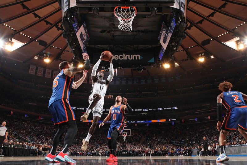 NEW YORK, NY - MARCH 23: Dennis Schroder #17 of the Brooklyn Nets drives to the basket during the game against the New York Knicks on March 23, 2024 at Madison Square Garden in New York City, New York.  NOTE TO USER: User expressly acknowledges and agrees that, by downloading and or using this photograph, User is consenting to the terms and conditions of the Getty Images License Agreement. Mandatory Copyright Notice: Copyright 2024 NBAE  (Photo by Nathaniel S. Butler/NBAE via Getty Images)