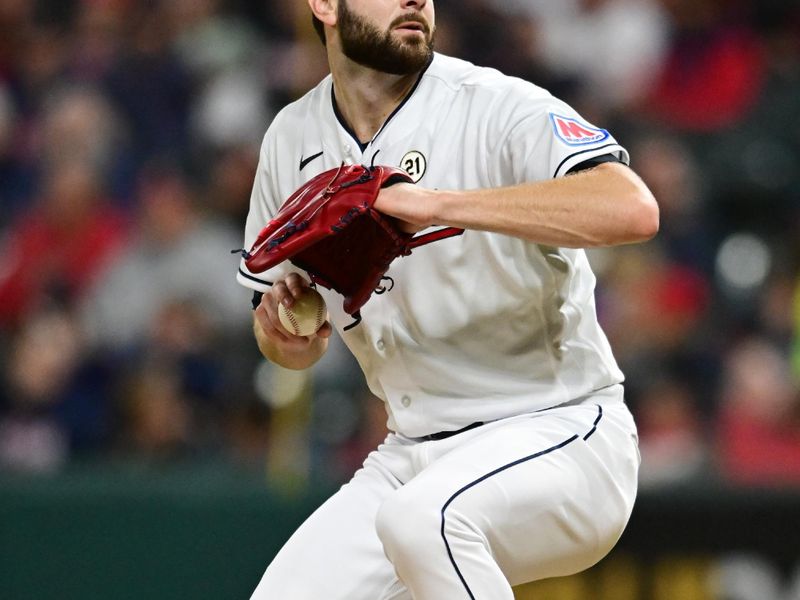 Sep 15, 2023; Cleveland, Ohio, USA; Cleveland Guardians starting pitcher Lucas Giolito (27) throws a pitch during the sixth inning against the Texas Rangers at Progressive Field. Mandatory Credit: Ken Blaze-USA TODAY Sports