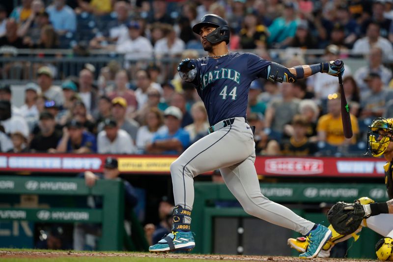 Aug 16, 2024; Pittsburgh, Pennsylvania, USA;  Seattle Mariners designated hitter Julio Rodríguez (44) hits a double against the Pittsburgh Pirates during the sixth inning at PNC Park. Mandatory Credit: Charles LeClaire-USA TODAY Sports