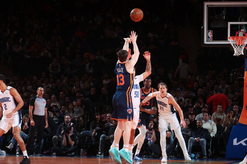 NEW YORK, NY - DECEMBER 3: Tyler Kolek #13 of the New York Knicks shoots a three point basket during the game  against the Orlando Magic during the Emirates NBA Cup on December 3, 2024 at Madison Square Garden in New York City, New York.  NOTE TO USER: User expressly acknowledges and agrees that, by downloading and or using this photograph, User is consenting to the terms and conditions of the Getty Images License Agreement. Mandatory Copyright Notice: Copyright 2024 NBAE  (Photo by Nathaniel S. Butler/NBAE via Getty Images)