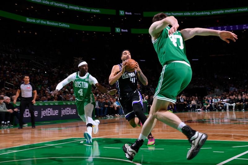 BOSTON, MA - APRIL 5: Trey Lyles #41 of the Sacramento Kings drives to the basket during the game against the Boston Celtics  on April 5, 2024 at the TD Garden in Boston, Massachusetts. NOTE TO USER: User expressly acknowledges and agrees that, by downloading and or using this photograph, User is consenting to the terms and conditions of the Getty Images License Agreement. Mandatory Copyright Notice: Copyright 2024 NBAE  (Photo by Brian Babineau/NBAE via Getty Images)