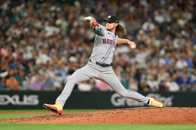 Jul 19, 2024; Seattle, Washington, USA; Houston Astros relief pitcher Josh Hader (71) pitches to the Seattle Mariners during the ninth inning at T-Mobile Park. Mandatory Credit: Steven Bisig-USA TODAY Sports