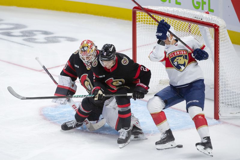 Oct 10, 2024; Ottawa, Ontario, CAN; Florida Panthers center Evan Rodrigues  (17) is unable to capilaize on a loose puck next to Ottawa Senators goalie Linus Ulmark (35) in the third period at the Canadian Tire Centre. Mandatory Credit: Marc DesRosiers-Imagn Images