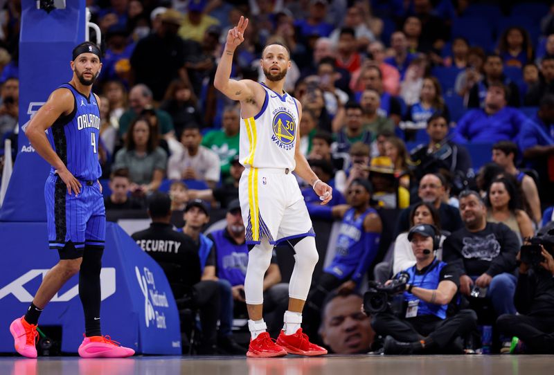 ORLANDO, FLORIDA - MARCH 27: Stephen Curry #30 of the Golden State Warriors looks on during a game against the Orlando Magic at Kia Center on March 27, 2024 in Orlando, Florida. NOTE TO USER: User expressly acknowledges and agrees that, by downloading and or using this photograph, User is consenting to the terms and conditions of the Getty Images License Agreement. (Photo by Mike Ehrmann/Getty Images)