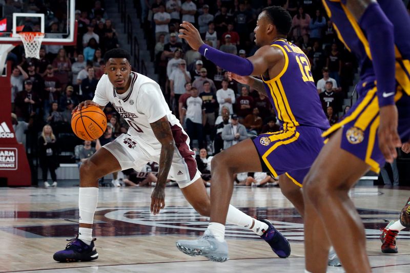 Feb 8, 2023; Starkville, Mississippi, USA; Mississippi State Bulldogs forward D.J. Jeffries (0) dribbles as LSU Tigers forward KJ Williams (12) defends during the first half at Humphrey Coliseum. Mandatory Credit: Petre Thomas-USA TODAY Sports