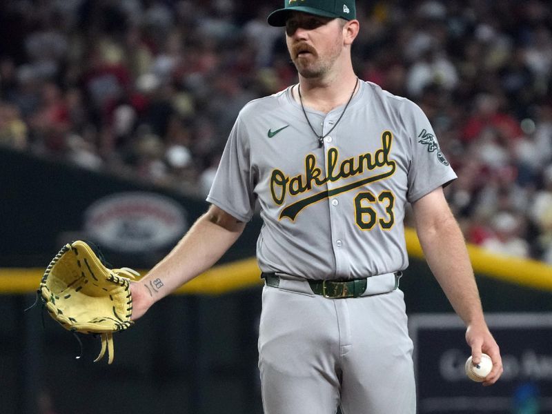 Jun 29, 2024; Phoenix, Arizona, USA; Oakland Athletics pitcher Hogan Harris (63) throws against the Arizona Diamondbacks in the first inning at Chase Field. Mandatory Credit: Rick Scuteri-USA TODAY Sports