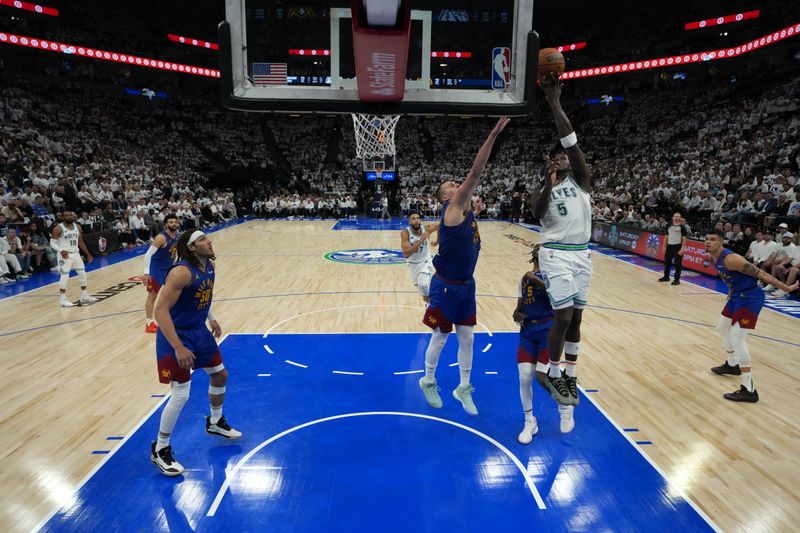 MINNEAPOLIS, MN -  MAY 16: Anthony Edwards #5 of the Minnesota Timberwolves shoots the ball during the game against the Denver Nuggets during Round 2 Game 6 of the 2024 NBA Playoffs on May 16, 2024 at Target Center in Minneapolis, Minnesota. NOTE TO USER: User expressly acknowledges and agrees that, by downloading and or using this Photograph, user is consenting to the terms and conditions of the Getty Images License Agreement. Mandatory Copyright Notice: Copyright 2024 NBAE (Photo by Jordan Johnson/NBAE via Getty Images)