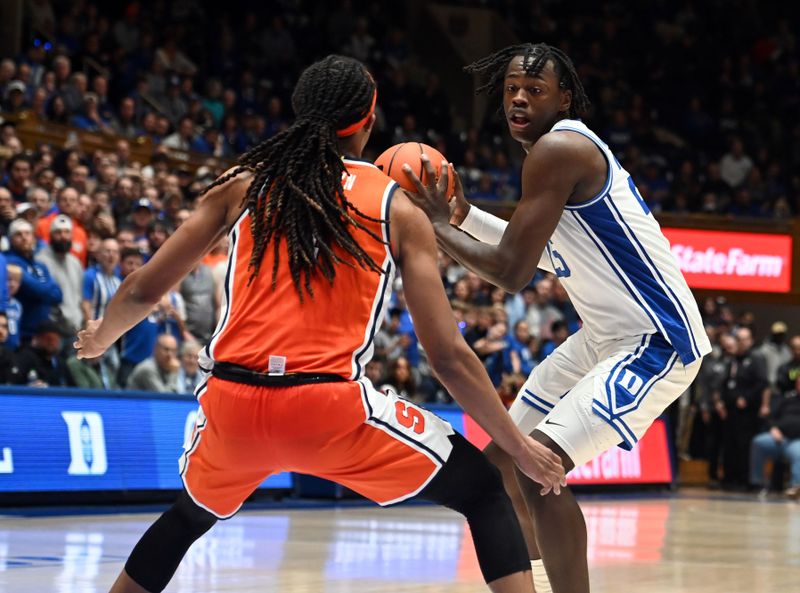 Jan 2, 2024; Durham, North Carolina, USA;  Duke Blue Devils forward Mark Mitchell (25) controls the ball in front of Syracuse Orange forward Maliq Brown (1) during the second half at Cameron Indoor Stadium.  The Blue Devils won 86-66. Mandatory Credit: Rob Kinnan-USA TODAY Sports