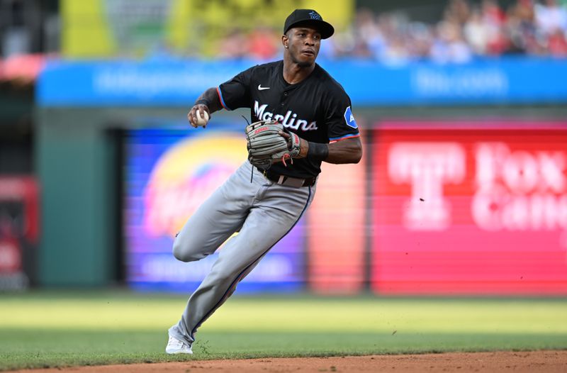 Jun 27, 2024; Philadelphia, Pennsylvania, USA; Miami Marlins infielder Tim Anderson (7) fields a ground ball against the Philadelphia Phillies in the second inning at Citizens Bank Park. Mandatory Credit: Kyle Ross-USA TODAY Sports