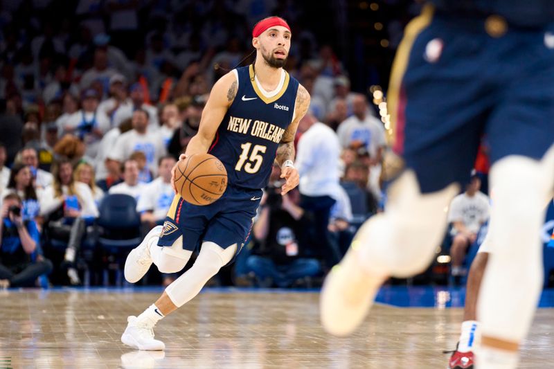 OKLAHOMA CITY, OKLAHOMA - APRIL 21: Jose Alvarado #15 of the New Orleans Pelicans brings the ball up court against the Oklahoma City Thunder in game one of the Western Conference First Round Playoffs at the Paycom Center on April 21, 2024 in Oklahoma City, Oklahoma. NOTE TO USER: User expressly acknowledges and agrees that, by downloading and or using this photograph, User is consenting to the terms and conditions of the Getty Images License Agreement.  (Photo by Cooper Neill/Getty Images)