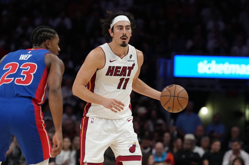 MIAMI, FL - OCTOBER 28:  Jaime Jaquez Jr. #11 of the Miami Heat dribbles the ball during the game against the Detroit Pistons on October 28, 2024 at Kaseya Center in Miami, Florida. NOTE TO USER: User expressly acknowledges and agrees that, by downloading and or using this Photograph, user is consenting to the terms and conditions of the Getty Images License Agreement. Mandatory Copyright Notice: Copyright 2024 NBAE (Photo by Eric Espada/NBAE via Getty Images)