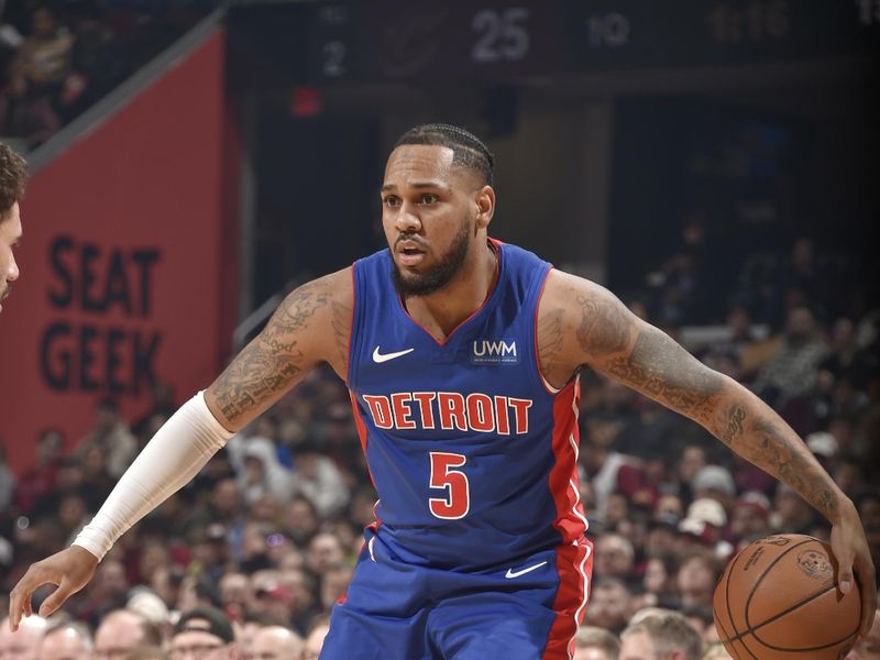 CLEVELAND, OH - JANUARY 31: Monte Morris #5 of the Detroit Pistons dribbles the ball during the game against the Cleveland Cavaliers on January 31, 2024 at Rocket Mortgage FieldHouse in Cleveland, Ohio. NOTE TO USER: User expressly acknowledges and agrees that, by downloading and/or using this Photograph, user is consenting to the terms and conditions of the Getty Images License Agreement. Mandatory Copyright Notice: Copyright 2024 NBAE (Photo by David Liam Kyle/NBAE via Getty Images)