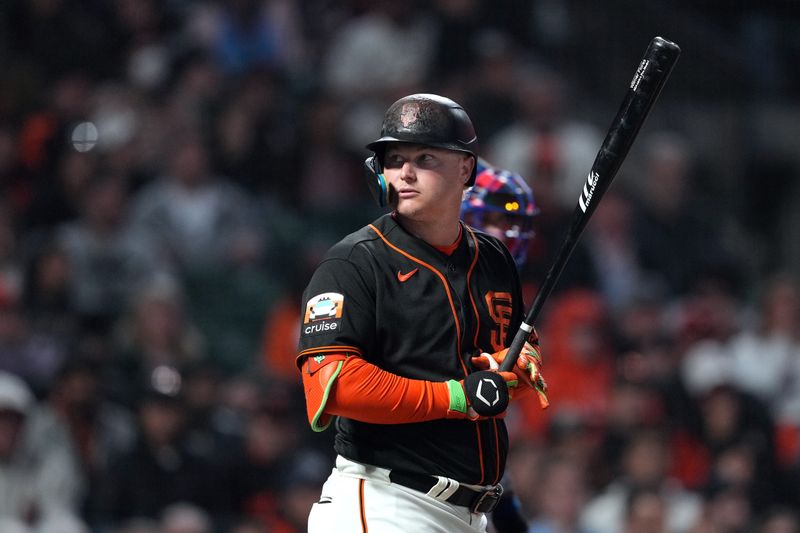 Aug 12, 2023; San Francisco, California, USA; San Francisco Giants pinch hitter Joc Pederson (23) prepares to bat with the bat of first baseman Wilmer Flores (41) during the eighth inning against the Texas Rangers at Oracle Park. Mandatory Credit: Darren Yamashita-USA TODAY Sports