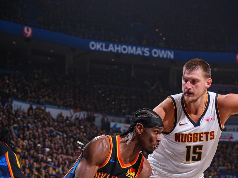 OKLAHOMA CITY, OK - MAY 5: Shai Gilgeous-Alexander #2 of the Oklahoma City Thunder handles the ball during the game against the Denver Nuggets during Round Two Game One of the 2025 NBA Playoffs on May 5, 2025 at Paycom Center in Oklahoma City, Oklahoma. NOTE TO USER: User expressly acknowledges and agrees that, by downloading and or using this photograph, User is consenting to the terms and conditions of the Getty Images License Agreement. Mandatory Copyright Notice: Copyright 2025 NBAE (Photo by Garrett Ellwood/NBAE via Getty Images)