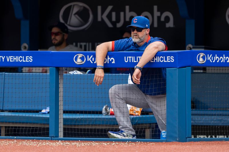 Aug 13, 2023; Toronto, Ontario, CAN; Chicago Cubs manager David Ross (3) looks on from the dugout against the Toronto Blue Jays during the eighth inning at Rogers Centre. Mandatory Credit: Kevin Sousa-USA TODAY Sports