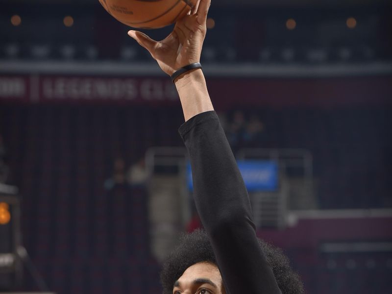 CLEVELAND, OH - JANUARY 29: Jarrett Allen #31 of the Cleveland Cavaliers warms up prior to the game against the LA Clippers on January 29, 2023 at Rocket Mortgage FieldHouse in Cleveland, Ohio. NOTE TO USER: User expressly acknowledges and agrees that, by downloading and/or using this Photograph, user is consenting to the terms and conditions of the Getty Images License Agreement. Mandatory Copyright Notice: Copyright 2023 NBAE (Photo by David Liam Kyle/NBAE via Getty Images)