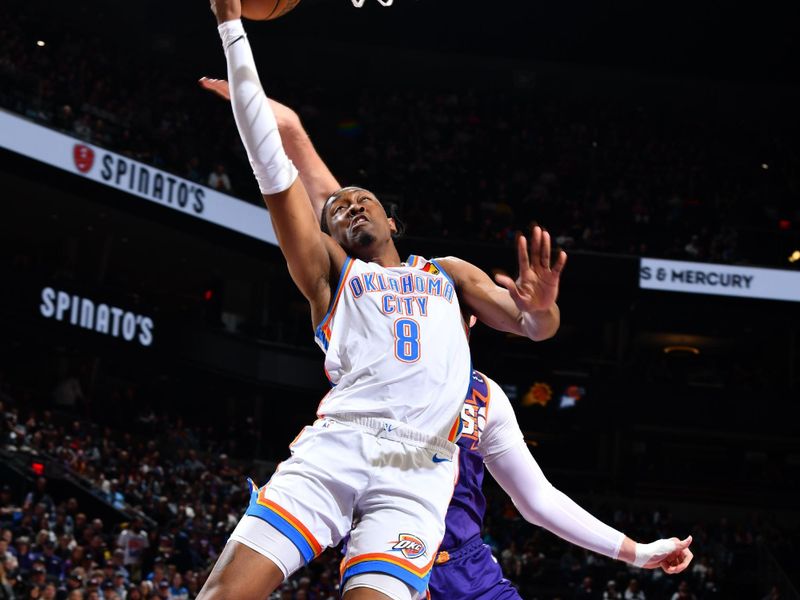 PHOENIX, AZ - MARCH 3: Jalen Williams #8 of the Oklahoma City Thunder drives to the basket during the game against the Phoenix Suns on March 3, 2024 at Footprint Center in Phoenix, Arizona. NOTE TO USER: User expressly acknowledges and agrees that, by downloading and or using this photograph, user is consenting to the terms and conditions of the Getty Images License Agreement. Mandatory Copyright Notice: Copyright 2024 NBAE (Photo by Barry Gossage/NBAE via Getty Images)