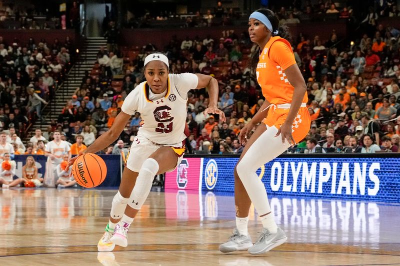 Mar 9, 2024; Greensville, SC, USA; South Carolina Gamecocks guard Bree Hall (23) handles the ball against Tennessee Lady Vols forward Rickea Jackson (2) during the second half at Bon Secours Wellness Arena. Mandatory Credit: Jim Dedmon-USA TODAY Sports