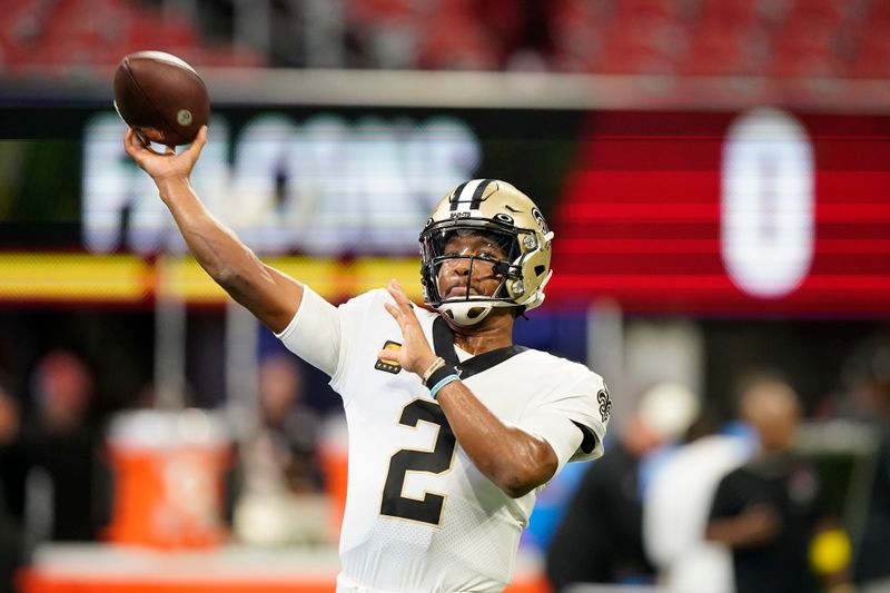 New Orleans Saints quarterback Jameis Winston (2) warms up before the first half of an NFL football game between the Atlanta Falcons and the New Orleans Saints, Sunday, Sept. 11, 2022, in Atlanta. (AP Photo/Brynn Anderson)