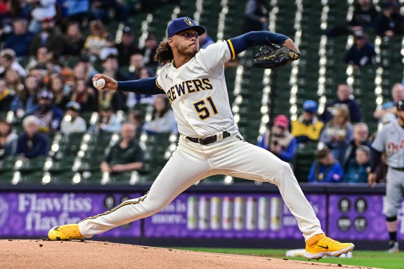 Apr 26, 2023; Milwaukee, Wisconsin, USA; Milwaukee Brewers pitcher Freddy Peralta (51) throws a pitch in the first inning against the Detroit Tigers at American Family Field. Mandatory Credit: Benny Sieu-USA TODAY Sports