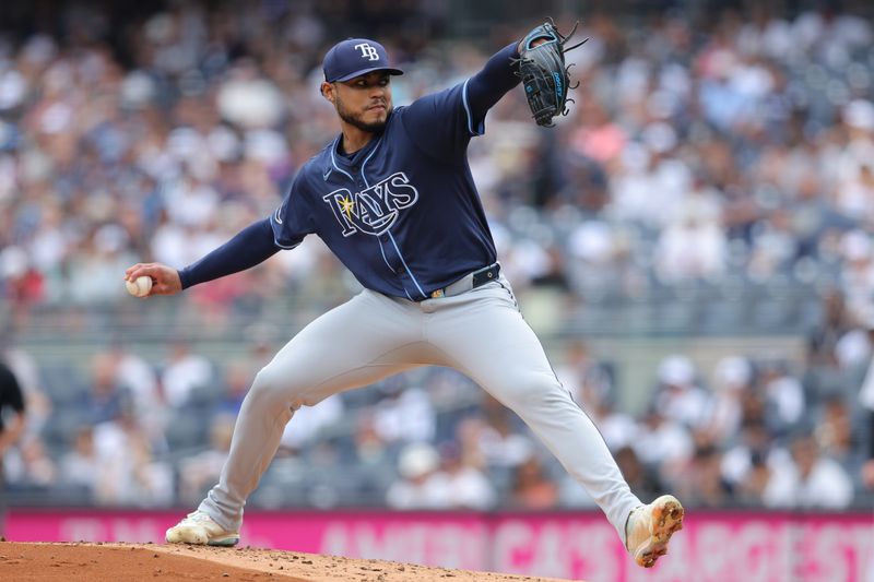 Jul 20, 2024; Bronx, New York, USA; Tampa Bay Rays starting pitcher Taj Bradley (45) pitches against the New York Yankees during the first inning at Yankee Stadium. Mandatory Credit: Brad Penner-USA TODAY Sports