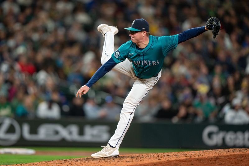 Sep 28, 2024; Seattle, Washington, USA; Seattle Mariners reliever Trent Thornton (46) delivers a pitch during the seventh inning against the Oakland Athletics at T-Mobile Park. Mandatory Credit: Stephen Brashear-Imagn Images