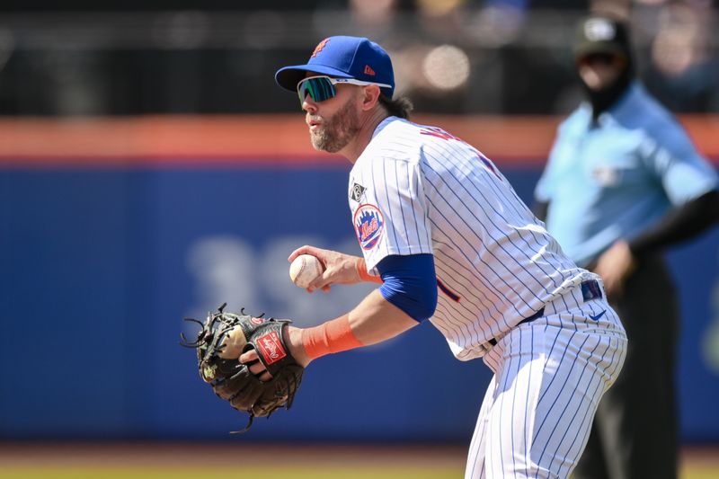 May 2, 2024; New York City, New York, USA; New York Mets second baseman Jeff McNeil (1) fields a ground ball and throws to first base for an out during the eighth inning against the Chicago Cubs at Citi Field. Mandatory Credit: John Jones-USA TODAY Sports