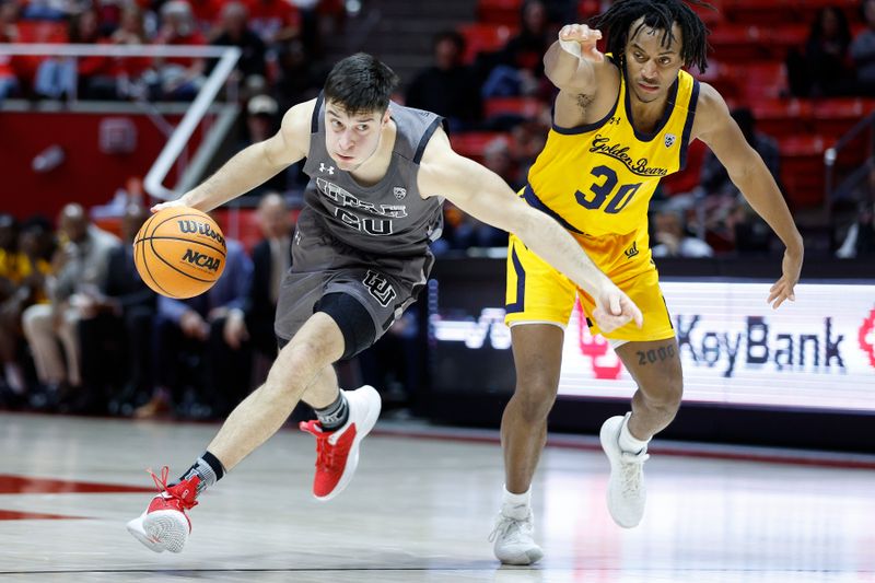 Feb 5, 2023; Salt Lake City, Utah, USA; Utah Utes guard Lazar Stefanovic (20) draws the foul from California Golden Bears guard Wrenn Robinson (30) in the second half at Jon M. Huntsman Center. Mandatory Credit: Jeffrey Swinger-USA TODAY Sports