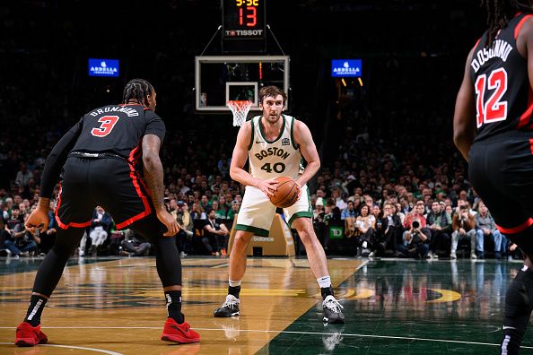 BOSTON, MA - NOVEMBER 28: Luke Kornet #40 of the Boston Celtics looks to pass the ball during the game against the Chicago Bulls during the In-Season Tournament on November 28, 2023 at the TD Garden in Boston, Massachusetts. NOTE TO USER: User expressly acknowledges and agrees that, by downloading and or using this photograph, User is consenting to the terms and conditions of the Getty Images License Agreement. Mandatory Copyright Notice: Copyright 2023 NBAE  (Photo by Brian Babineau/NBAE via Getty Images)