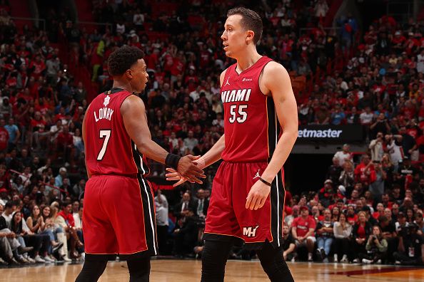 MIAMI, FL - DECEMBER 25:  Kyle Lowry #7 of the Miami Heat & Duncan Robinson #55 of the Miami Heat high five during the game  on December 25, 2023 at Kaseya Center Arena in Miami, Florida. NOTE TO USER: User expressly acknowledges and agrees that, by downloading and or using this Photograph, user is consenting to the terms and conditions of the Getty Images License Agreement. Mandatory Copyright Notice: Copyright 2023 NBAE (Photo by Issac Baldizon/NBAE via Getty Images)