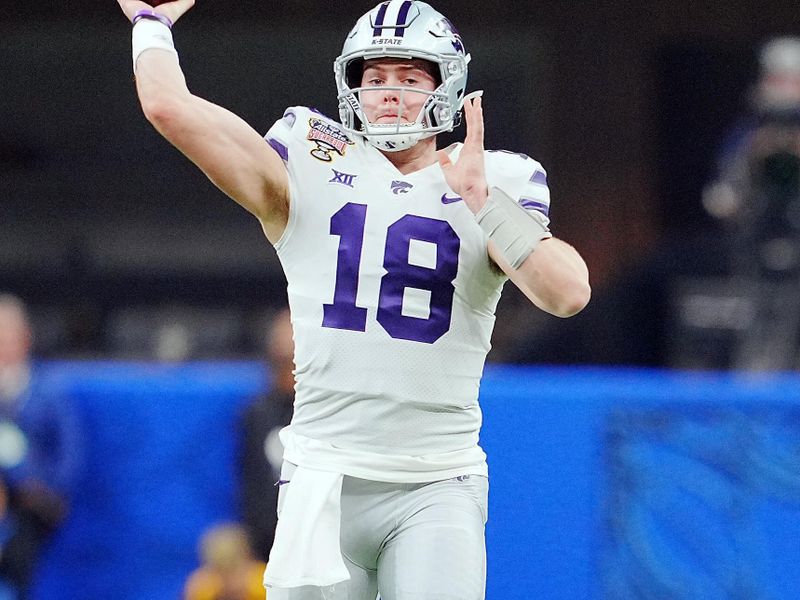 Dec 31, 2022; New Orleans, LA, USA; Kansas State Wildcats quarterback Will Howard (18) throws against the Alabama Crimson Tide during the first half in the 2022 Sugar Bowl at Caesars Superdome. Mandatory Credit: Andrew Wevers-USA TODAY Sports