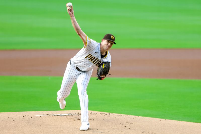 Jun 9, 2025; San Diego, California, USA; San Diego Padres starting pitcher Nick Pivetta (27) throws a pitch during the first inning against the Los Angeles Dodgers at Petco Park. Mandatory Credit: David Frerker-Imagn Images