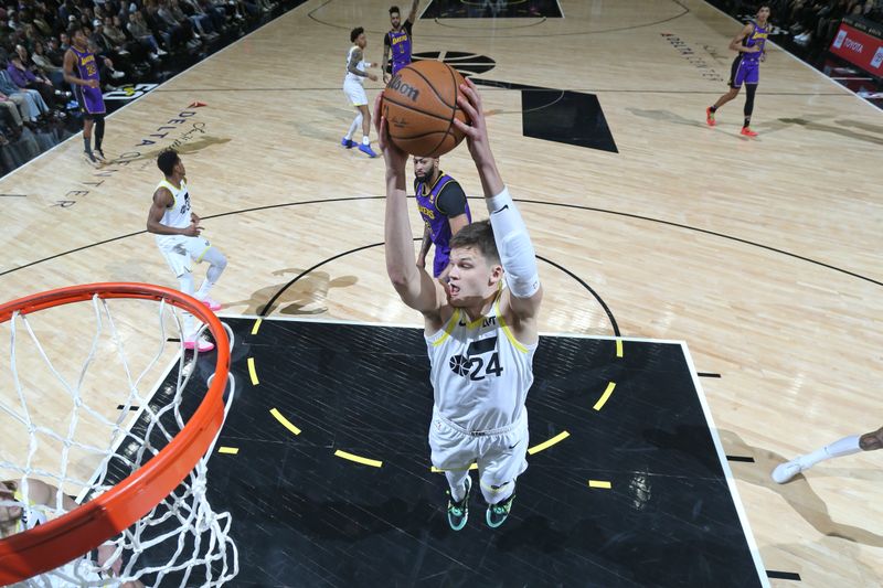 SALT LAKE CITY, UT - JANUARY 13: Walker Kessler #24 of the Utah Jazz rebounds the ball during the game against the Los Angeles Lakers on January 13, 2024 at vivint.SmartHome Arena in Salt Lake City, Utah. NOTE TO USER: User expressly acknowledges and agrees that, by downloading and or using this Photograph, User is consenting to the terms and conditions of the Getty Images License Agreement. Mandatory Copyright Notice: Copyright 2024 NBAE (Photo by Melissa Majchrzak/NBAE via Getty Images)