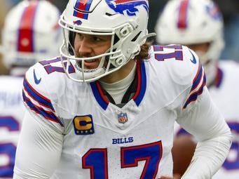 Buffalo Bills quarterback Josh Allen (17) takes a snap prior to an NFL football game against the New England Patriots, Sunday, Jan. 5, 2025, in Foxborough, Mass. (AP Photo/Greg M. Cooper)