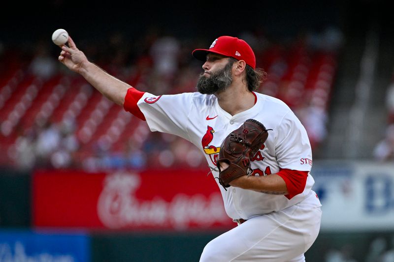 Jul 30, 2024; St. Louis, Missouri, USA;  St. Louis Cardinals starting pitcher Lance Lynn (31) pitches against the Texas Rangers during the first inning at Busch Stadium. Mandatory Credit: Jeff Curry-USA TODAY Sports