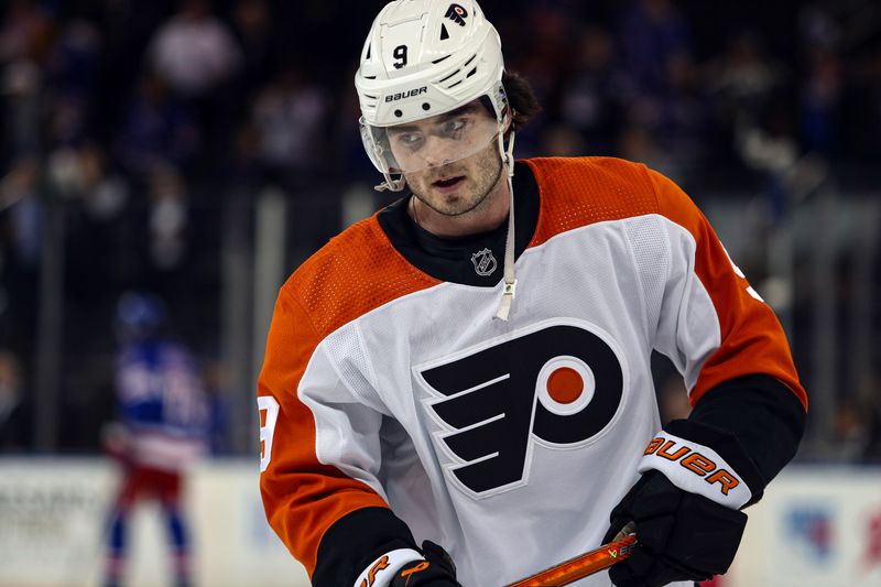 Apr 11, 2024; New York, New York, USA; Philadelphia Flyers defenseman Jamie Drysdale (9) warms up before the first period against the New York Rangers at Madison Square Garden. Mandatory Credit: Danny Wild-USA TODAY Sports