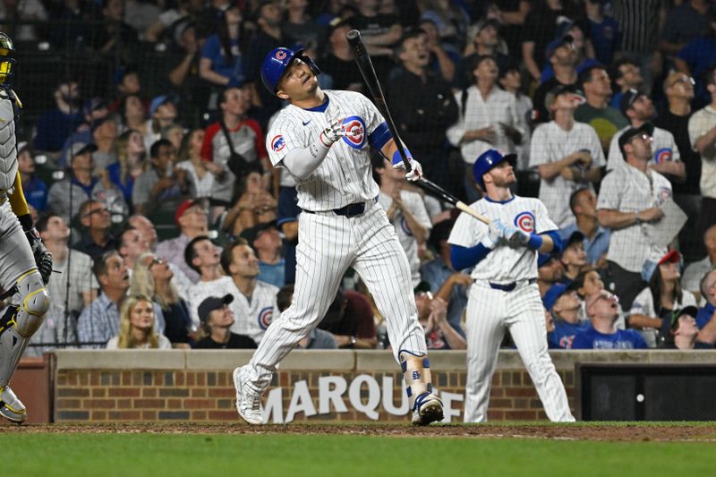 Jul 23, 2024; Chicago, Illinois, USA;  Chicago Cubs outfielder Seiya Suzuki (27) reacts after flying out against the Milwaukee Brewers during the eighth inning at Wrigley Field. Mandatory Credit: Matt Marton-USA TODAY Sports