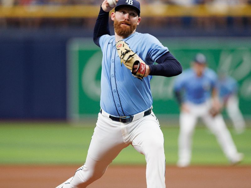 Jun 9, 2024; St. Petersburg, Florida, USA;  Tampa Bay Rays pitcher Zack Littell (52) throws a pitch against the Baltimore Orioles in the second inning at Tropicana Field. Mandatory Credit: Nathan Ray Seebeck-USA TODAY Sports