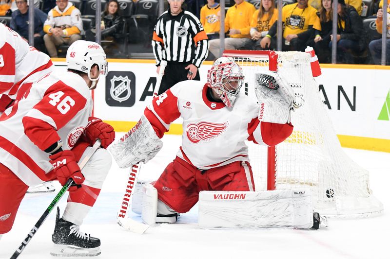 Mar 23, 2024; Nashville, Tennessee, USA; Detroit Red Wings goaltender Alex Lyon (34) allows the game winning goal during the third period against the Nashville Predators at Bridgestone Arena. Mandatory Credit: Christopher Hanewinckel-USA TODAY Sports