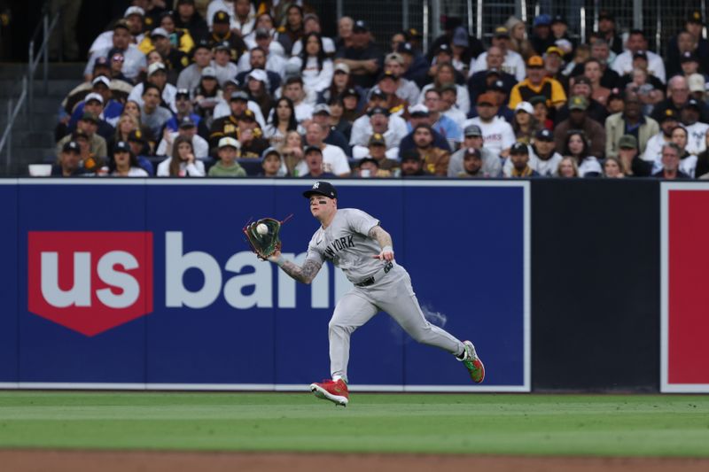 May 25, 2024; San Diego, California, USA; New York Yankees left fielder Alex Verdugo (24) catches a fly ball in the third inning against the San Diego Padres at Petco Park. Mandatory Credit: Chadd Cady-USA TODAY Sports