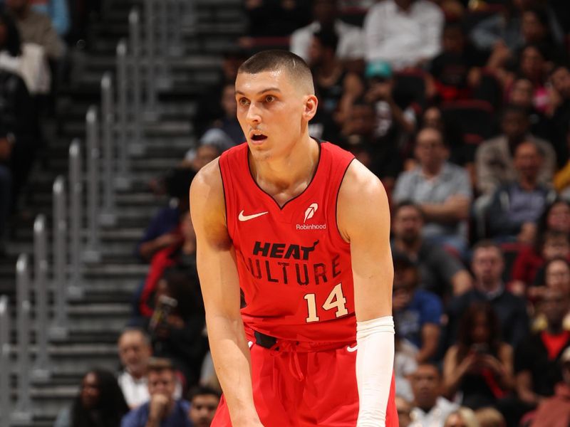 MIAMI, FL - NOVEMBER 24: Tyler Herro #14 of the Miami Heat dribbles the ball during the game against the Dallas Mavericks on November 24, 2024 at Kaseya Center in Miami, Florida. NOTE TO USER: User expressly acknowledges and agrees that, by downloading and or using this Photograph, user is consenting to the terms and conditions of the Getty Images License Agreement. Mandatory Copyright Notice: Copyright 2024 NBAE (Photo by Issac Baldizon/NBAE via Getty Images)