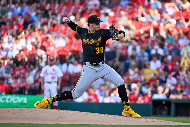 Jun 11, 2024; St. Louis, Missouri, USA;  Pittsburgh Pirates starting pitcher Paul Skenes (30) pitches against the St. Louis Cardinals during the first inning at Busch Stadium. Mandatory Credit: Jeff Curry-USA TODAY Sports