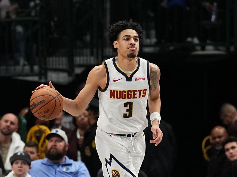 DALLAS, TX - JANUARY 14:  Julian Strawther #3 of the Denver Nuggets dribbles the ball during the game against the Dallas Mavericks on January 14, 2025 at American Airlines Center in Dallas, Texas. NOTE TO USER: User expressly acknowledges and agrees that, by downloading and or using this photograph, User is consenting to the terms and conditions of the Getty Images License Agreement. Mandatory Copyright Notice: Copyright 2025 NBAE (Photo by Glenn James/NBAE via Getty Images)