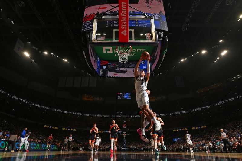 OKLAHOMA CITY, OK - APRIL 14: Josh Green #8 of the Dallas Mavericks shoots the ball during the game against the Oklahoma City Thunder on April 14, 2024 at Paycom Arena in Oklahoma City, Oklahoma. NOTE TO USER: User expressly acknowledges and agrees that, by downloading and or using this photograph, User is consenting to the terms and conditions of the Getty Images License Agreement. Mandatory Copyright Notice: Copyright 2024 NBAE (Photo by Zach Beeker/NBAE via Getty Images)