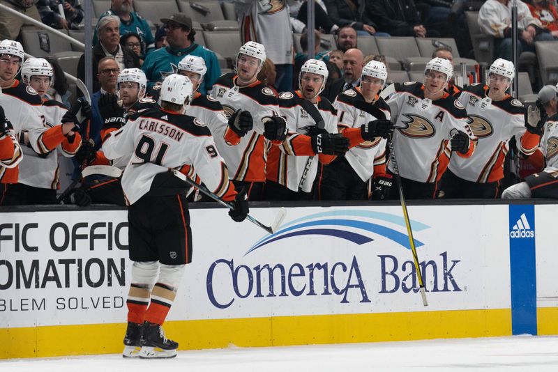 Feb 29, 2024; San Jose, California, USA; Anaheim Ducks center Leo Carlsson (91) celebrates with the team during the first period against the San Jose Sharks at SAP Center at San Jose. Mandatory Credit: Stan Szeto-USA TODAY Sports