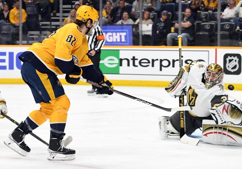 Apr 4, 2023; Nashville, Tennessee, USA; Nashville Predators center Tommy Novak (82). scores against Vegas Golden Knights goaltender Jonathan Quick (32) during the first period at Bridgestone Arena. Mandatory Credit: Christopher Hanewinckel-USA TODAY Sports