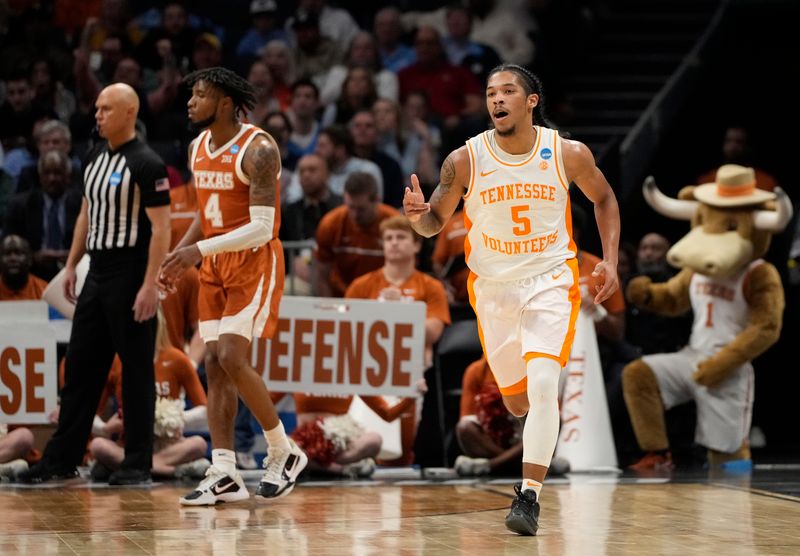 March 23, 2024, Charlotte, NC, USA; Tennessee Volunteers guard Zakai Zeigler (5) reacts after a three pointer against the Texas Longhorns  in the second round of the 2024 NCAA Tournament at the Spectrum Center. Mandatory Credit: Bob Donnan-USA TODAY Sports